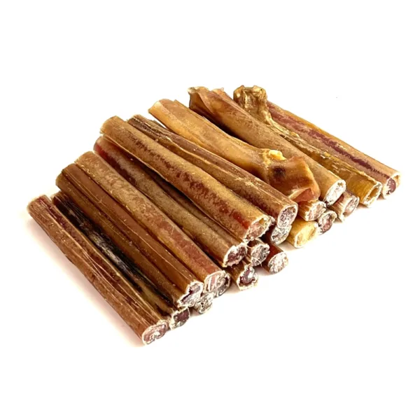 6" Low-Grade Bully Sticks, Medium Odor, in a large stack