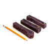 Blueberry Yak Chews next to a pencil for comparison