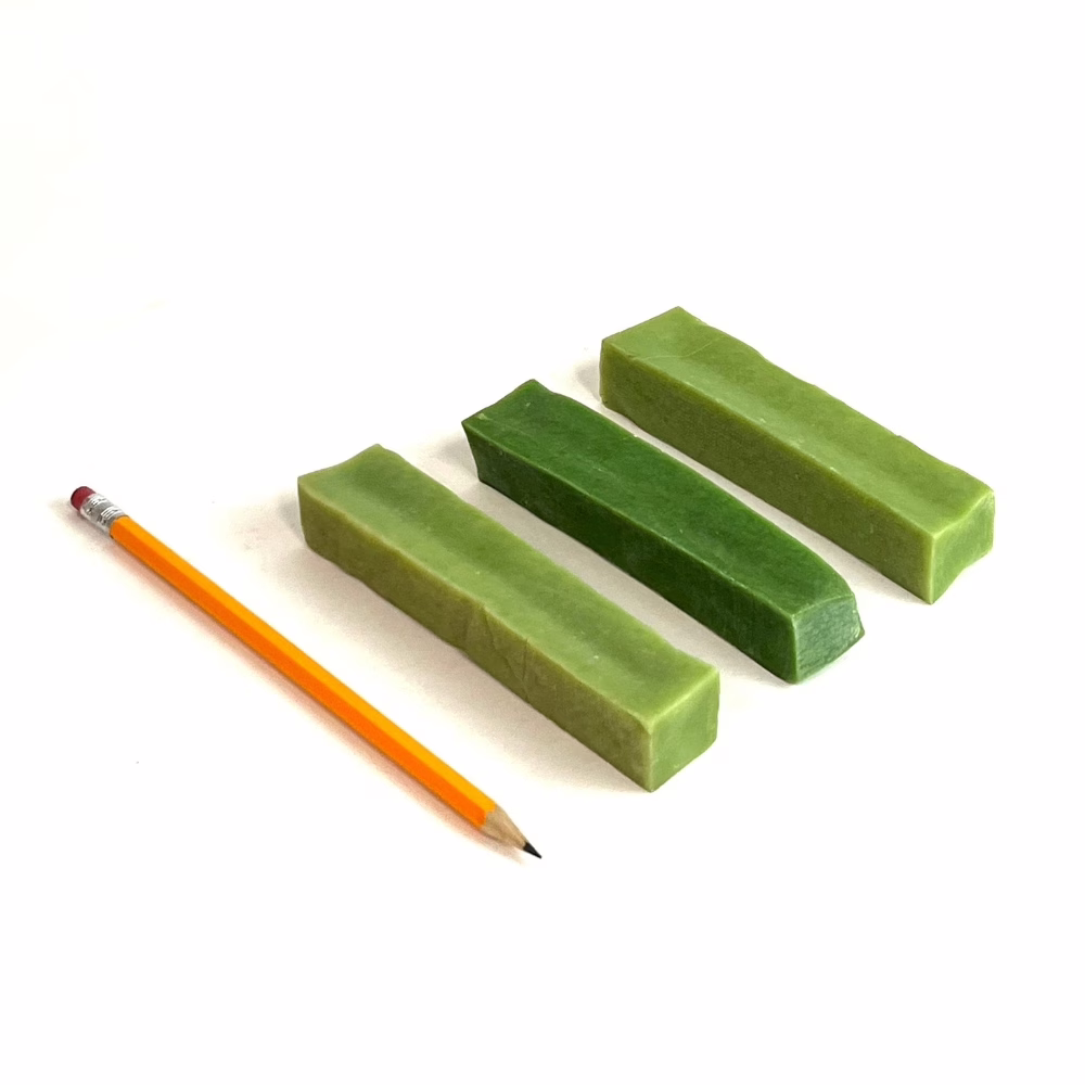 Mint Yak Chews next to a pencil for comparison