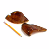Pig ears, low odor, next to a pencil for comparison