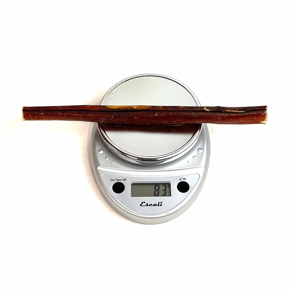 12" Bully Sticks - Overcooked/Imperfect **Tend To Chew Through More Quickly** | Jumbo (75-89g) | Low Odor 3 12" straight bully sticks, jumbo, overcooked, imperfect appearance, low odor, scale