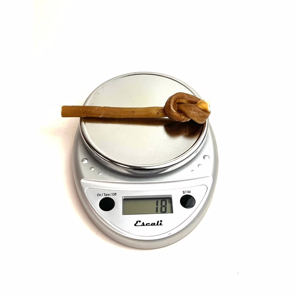 6" Bully Lollipop | Mid (15-25g) | Low-Medium Odor 3 6" lollipop bully sticks, mid, low-medium odor, on a scale